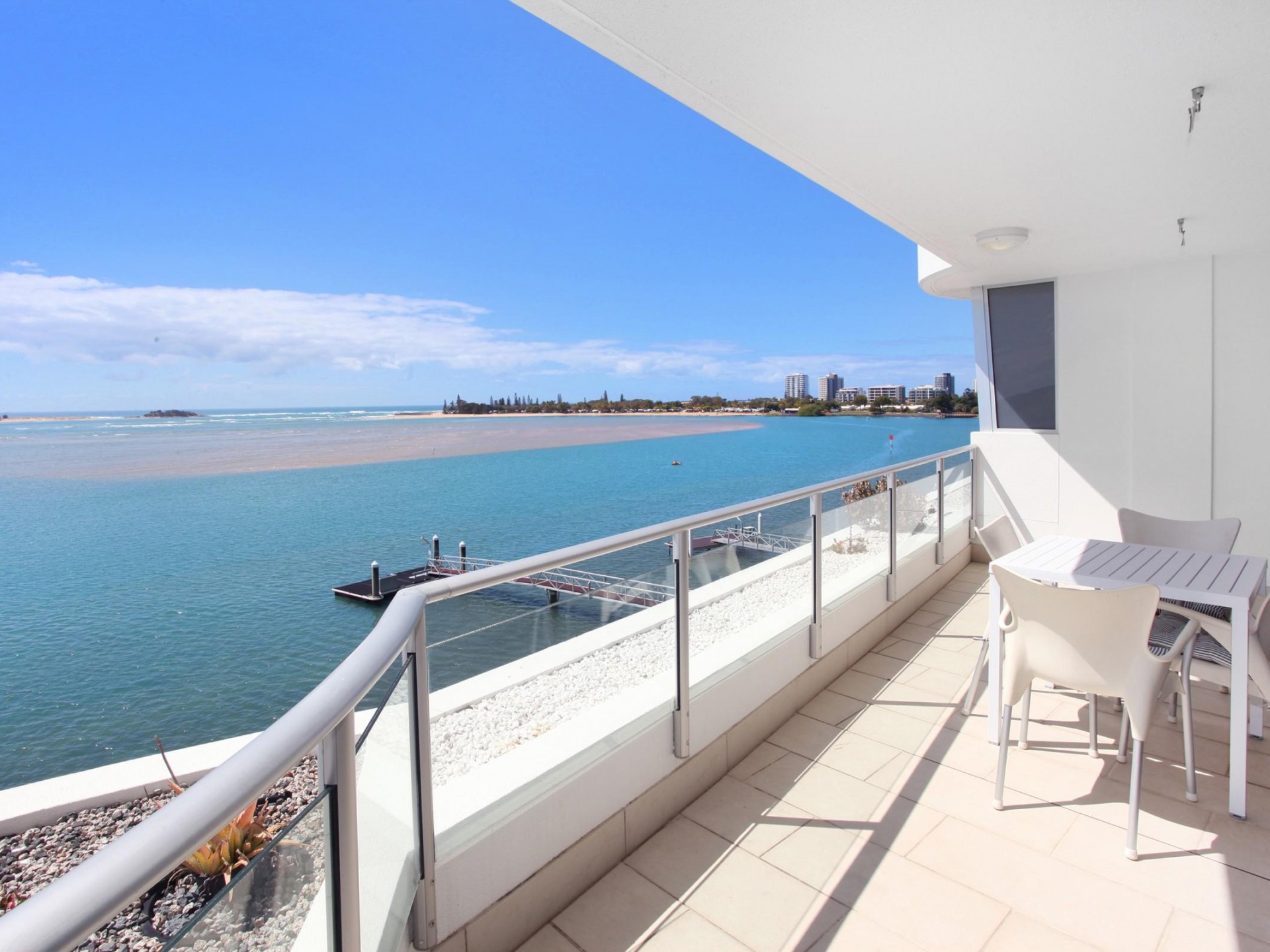ABSOLUTE WATERFRONT UNIT WITH AMAZING RIVER/OCEAN VIEWS!